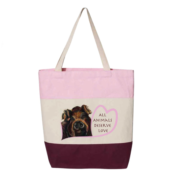 Rescued Pig tote bag with maroon and pink panels. Bella is a pig that lives at Loving Farm Animal Sanctuary in California